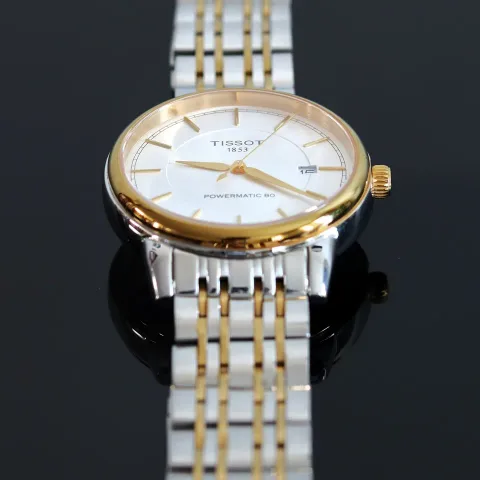 Reloj de acero dorado, de la tienda de muestra Casa Vidal